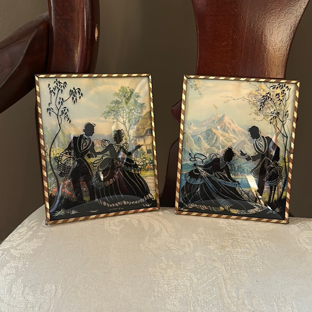 1930s reverse painted convex bubble glass silhouettes, courting scene, pair